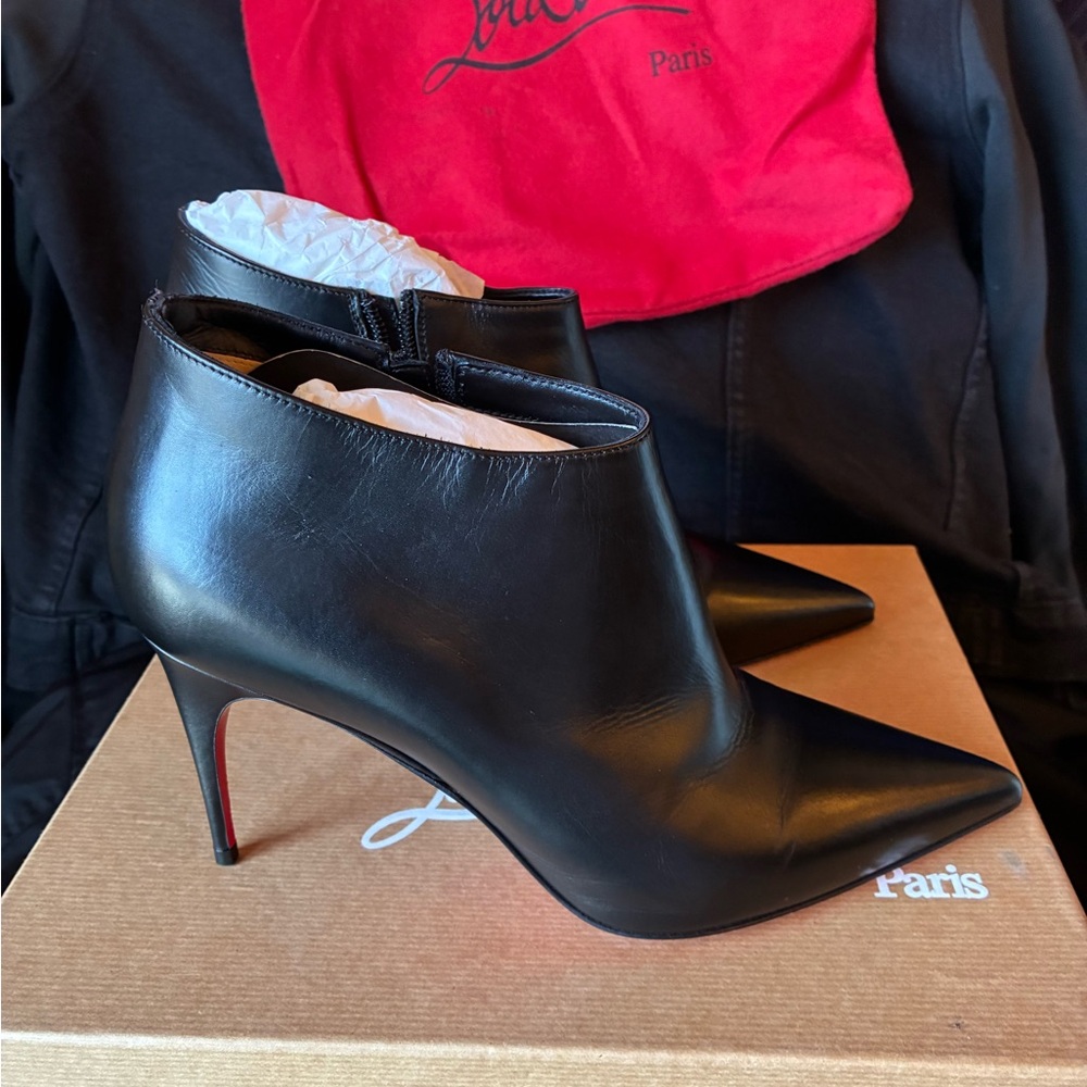 Christian Louboutin Black Leather Pointed Toe Ankle Booties with Red Sole